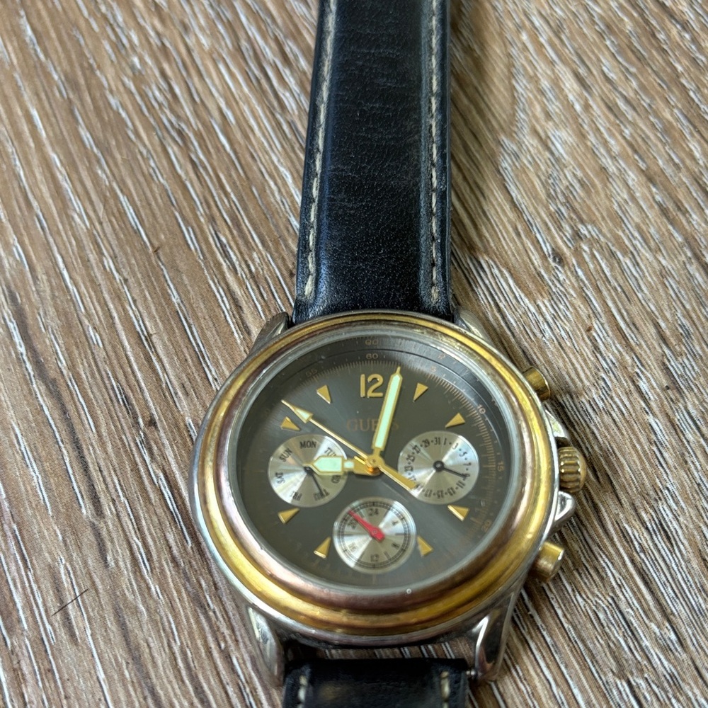 Guess Gold and Black Chronograph Watch will need a battery